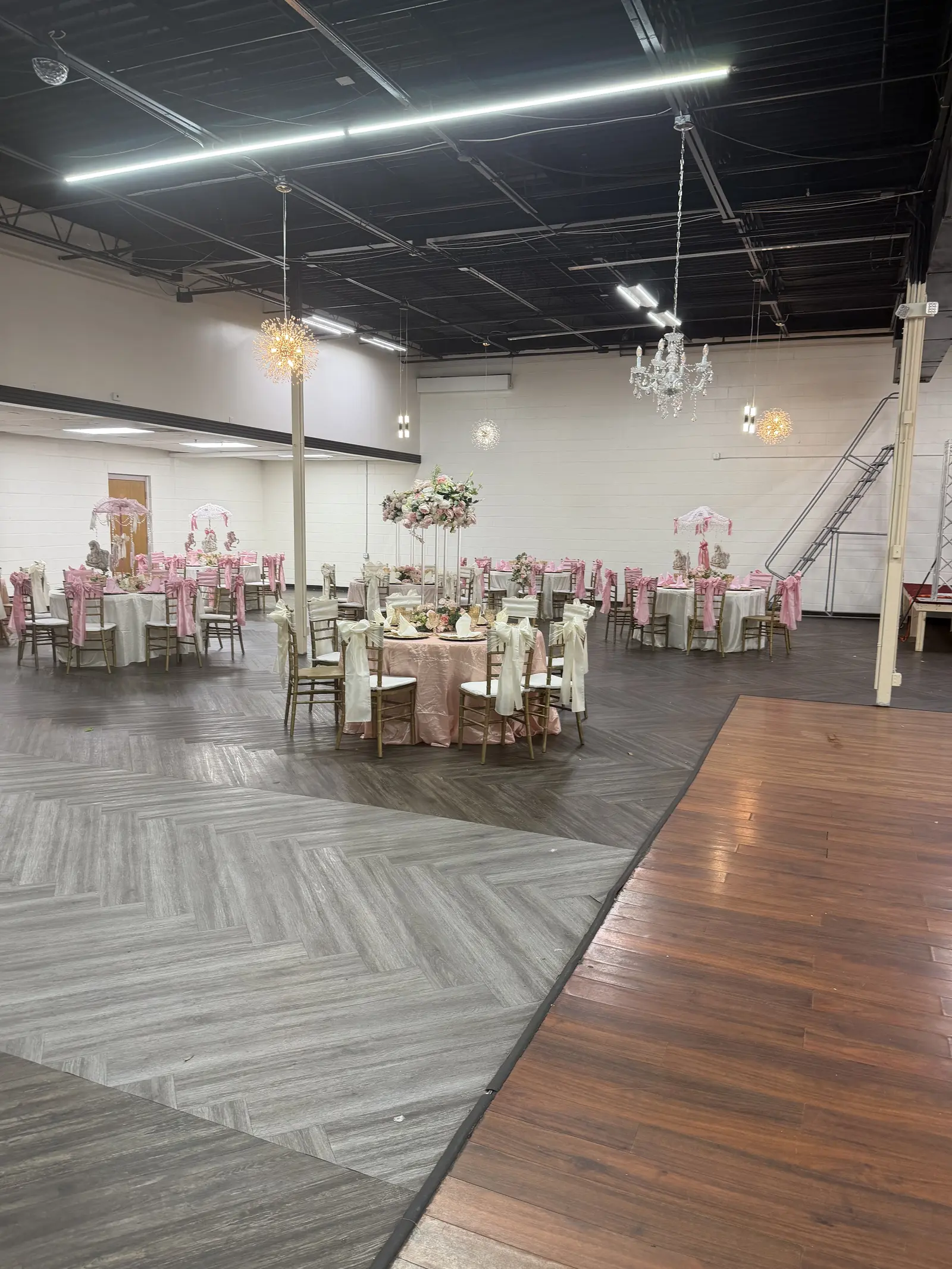 Wide view of the Golden Palace Ballroom floor set for a celebration