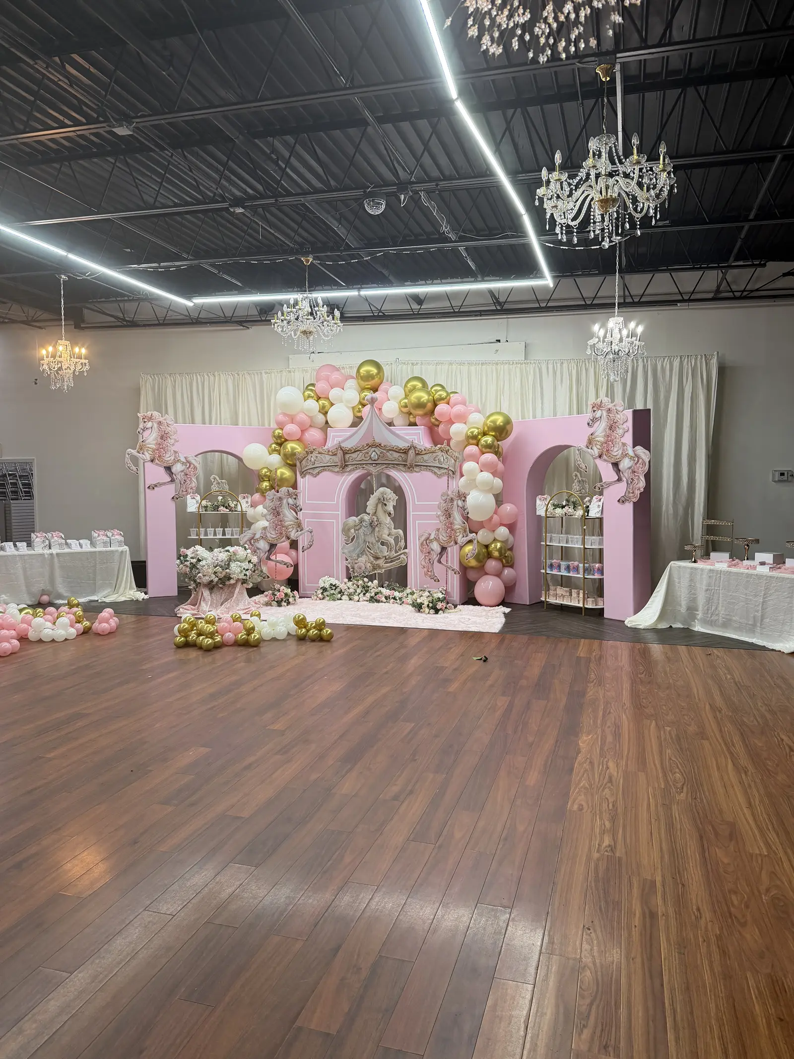 Pink balloon backdrop and celebration display